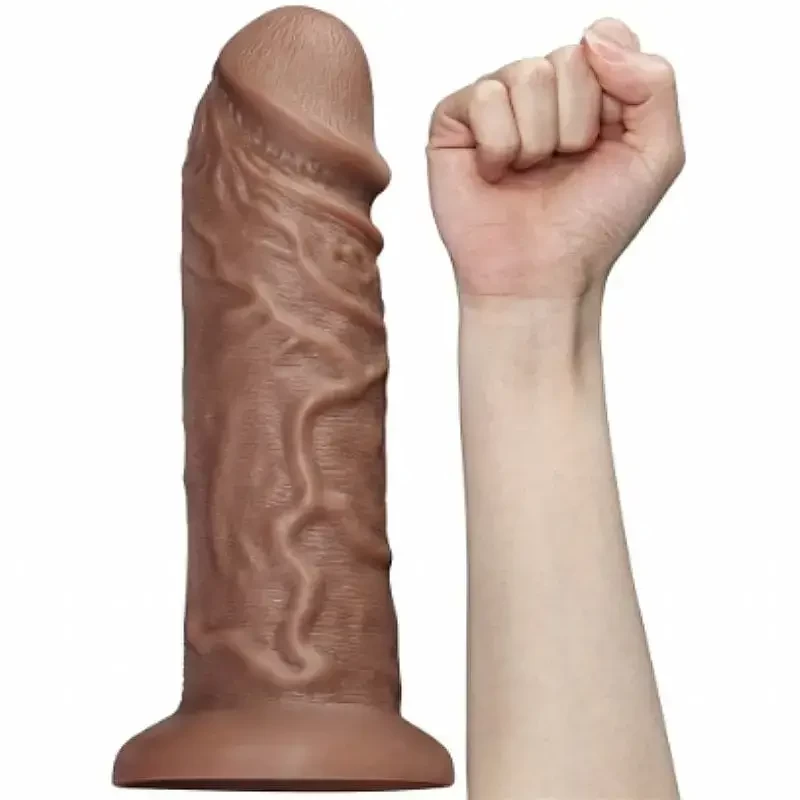Imagem de braço perto de pênis realista de 26cm
