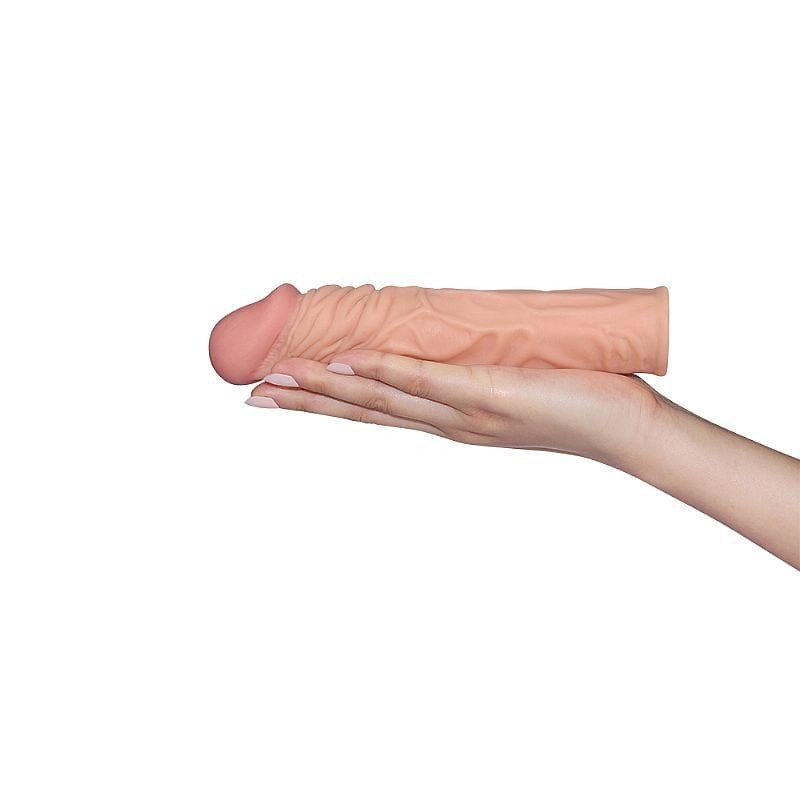 palmacapa peniana sobre mão feminina cor clara mede 19,5 cm por 4 cm