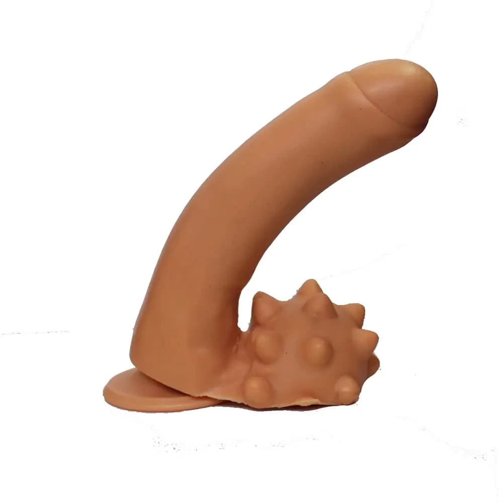 Imagem de um pênis de borracha com ventosa e saco massageador