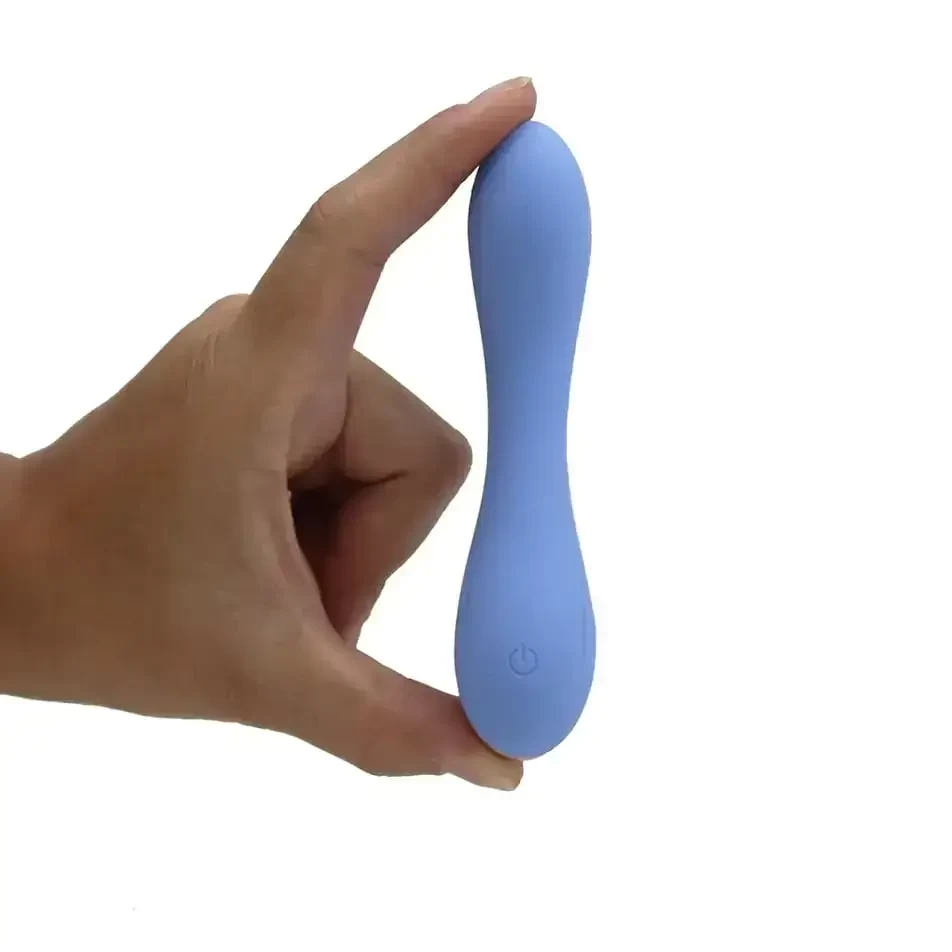 imagem de vibrador ponto g entre dois dedos de mão feminina